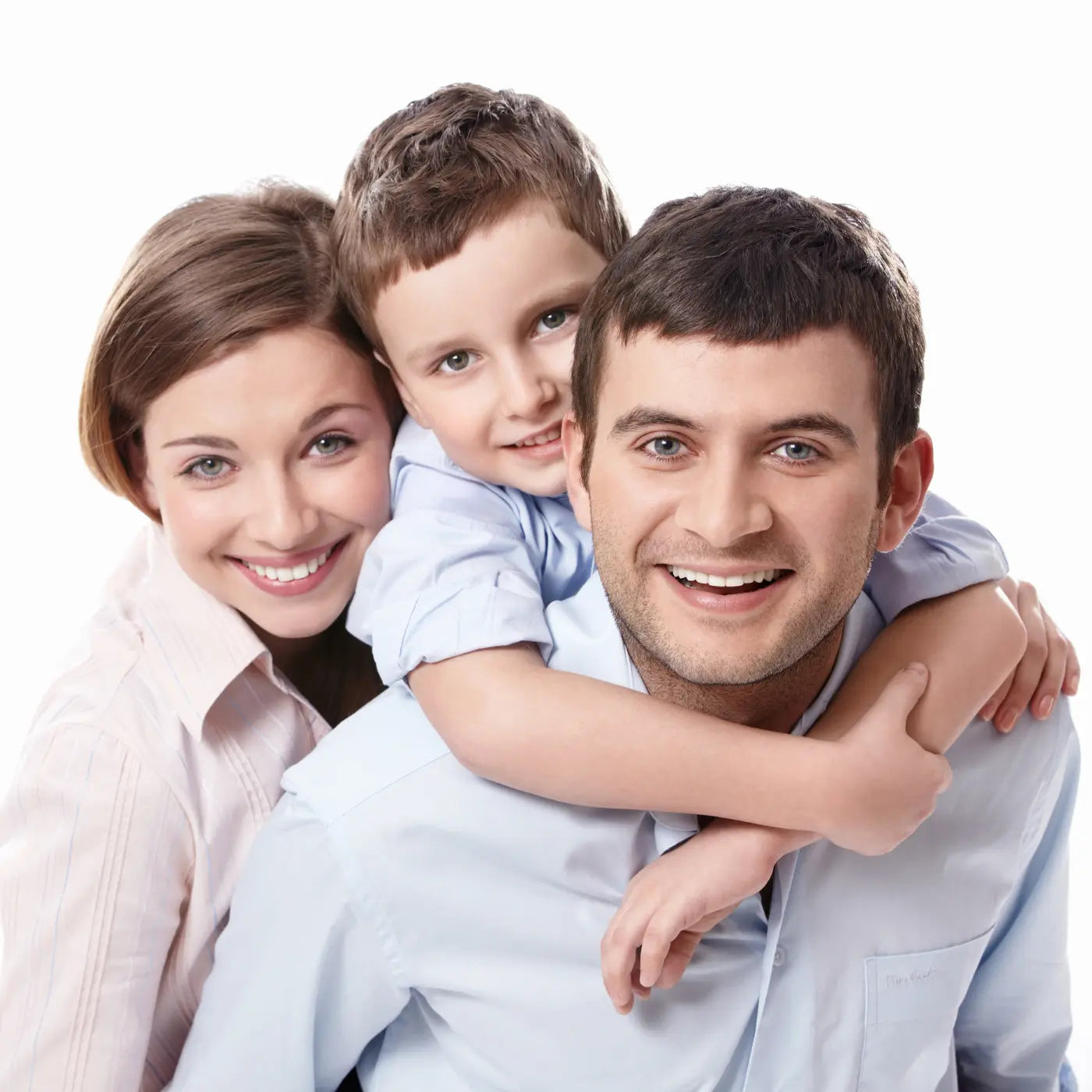 Close up family smiling looking at camera