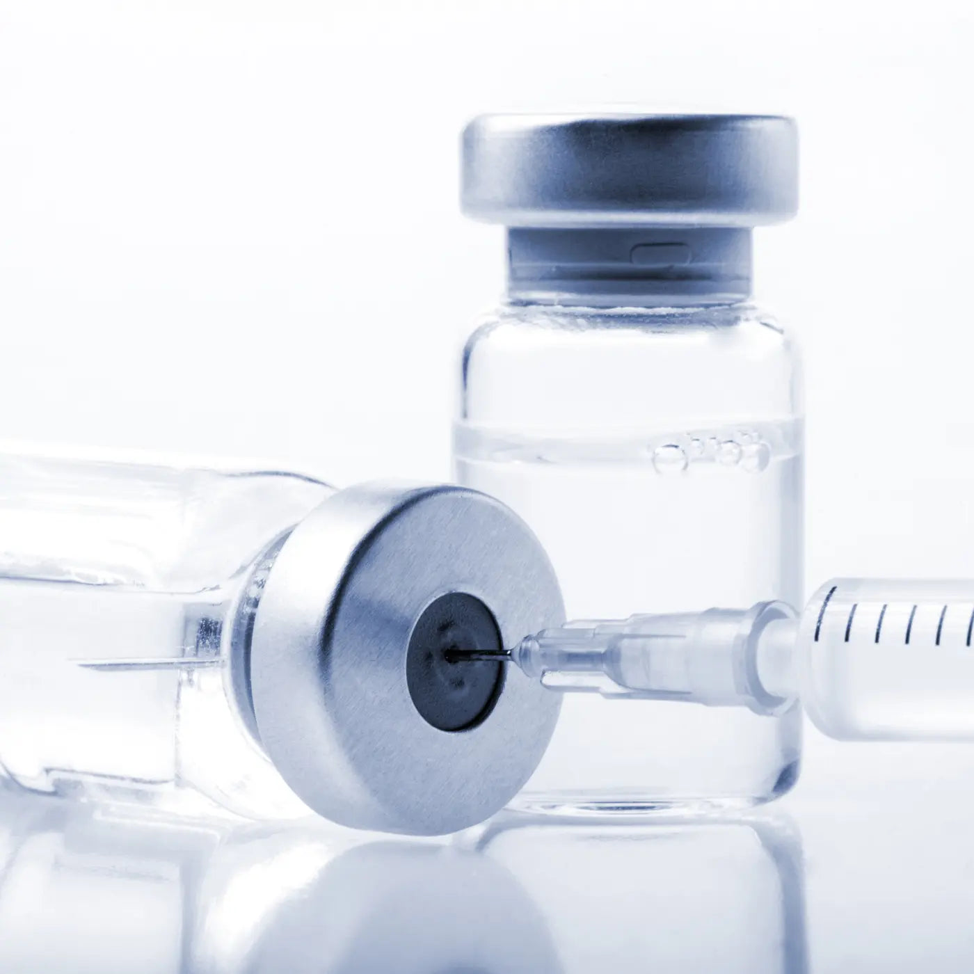 Vials of botox with a syringe