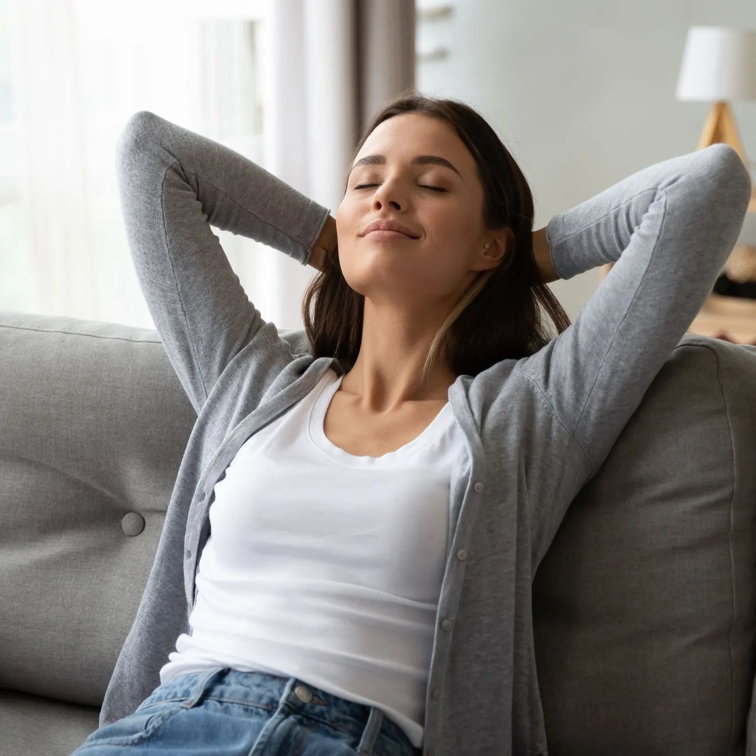 woman relaxing on sofa 
